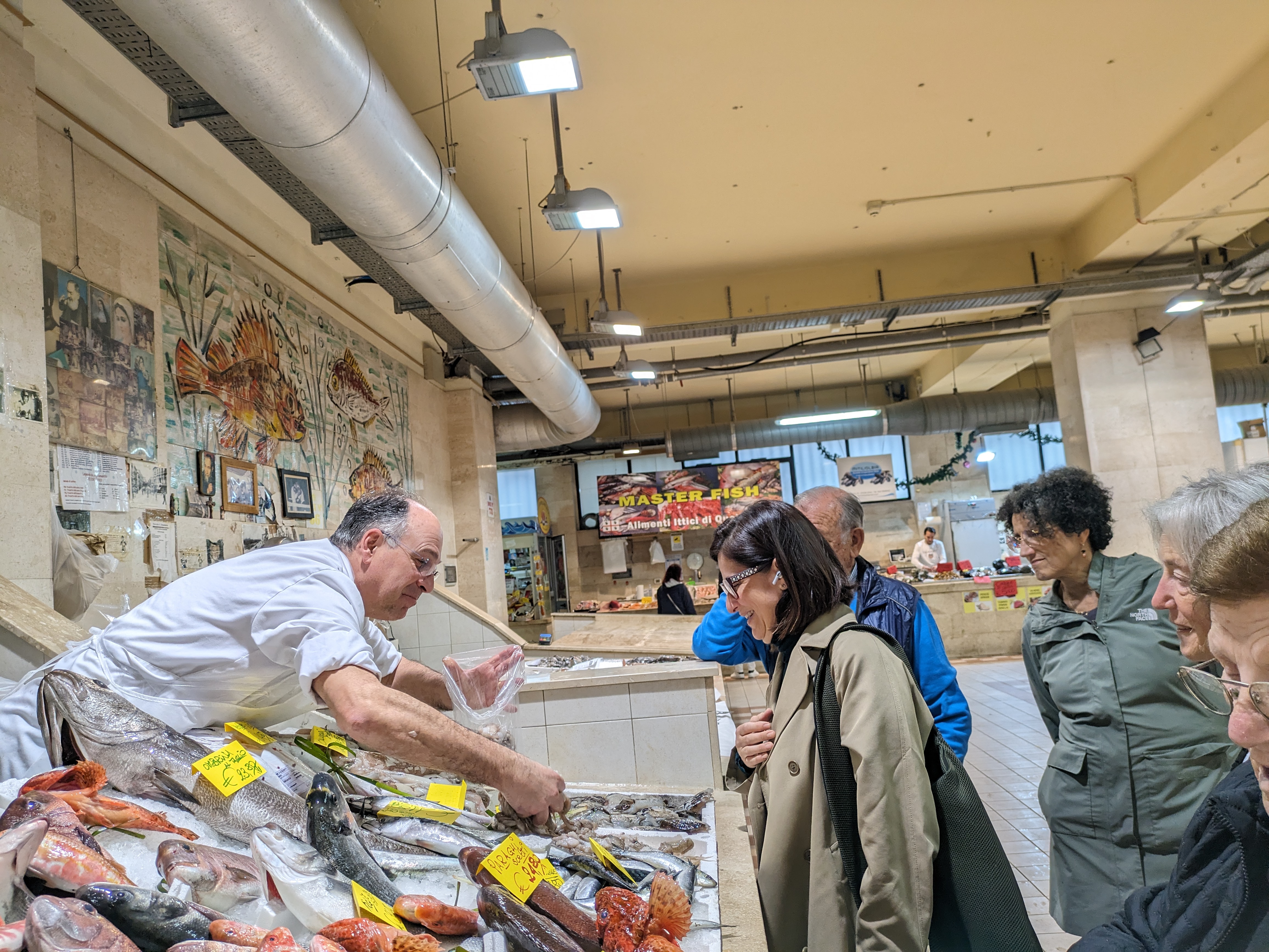 Choosing fish at the Civic Market, Cagliari