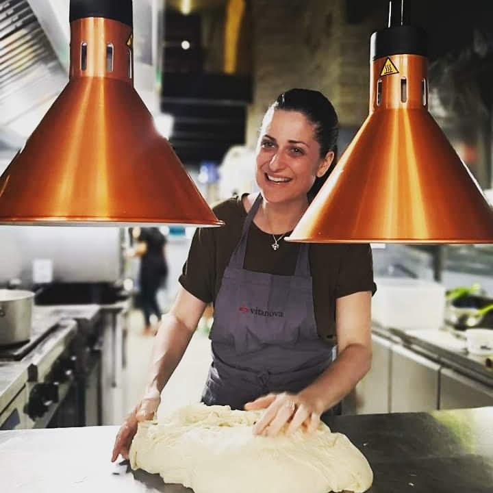 Laura Sechi kneading dough at Vita Nova